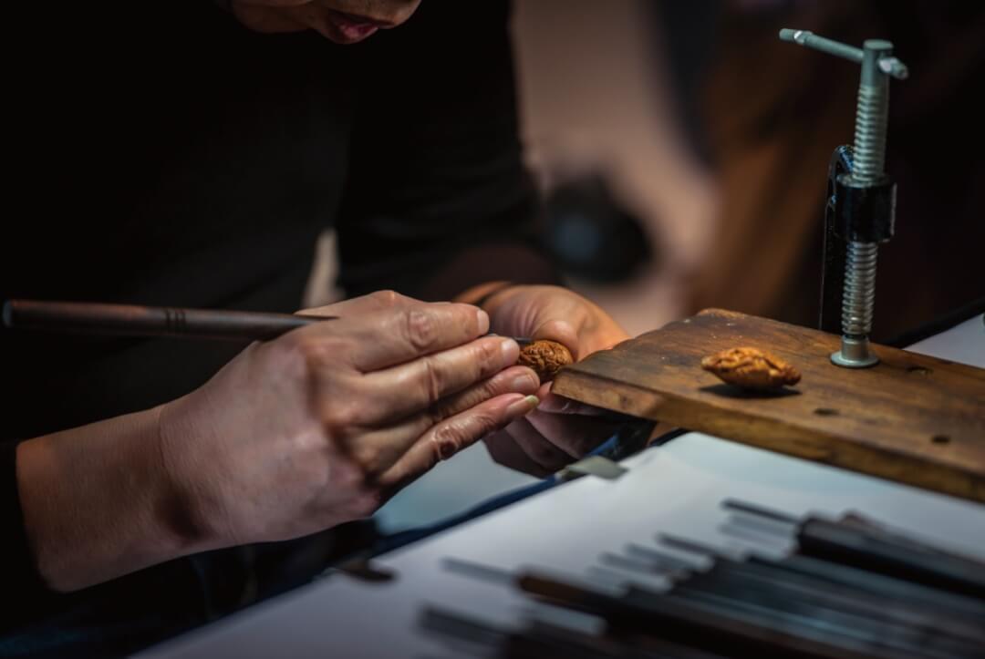 Suzhou Craftsmen’s Fruit Pit Carving